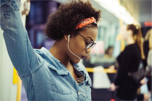 productive daily commute girl listening to music